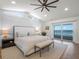 Beautiful main bedroom with a private balcony and ocean views at 6530 S Atlantic Ave, New Smyrna Beach, FL 32169