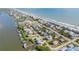 Picturesque aerial view of a seaside community, boasting both ocean and riverfront properties at 6860 Turtlemound Rd, New Smyrna Beach, FL 32169