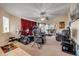 Spacious bonus room set up as a home gym with comfortable seating area at 6860 Turtlemound Rd, New Smyrna Beach, FL 32169