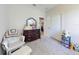 bedroom featuring dresser, chair, and plush rug at 727 Porter Rye Ave, Debary, FL 32713