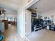 Open bonus room features playful décor, carpeted floors, and abundant display shelving for collectibles at 727 Porter Rye Ave, Debary, FL 32713