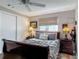 Comfortable bedroom with neutral tones, soft lighting, wood furniture and a cozy atmosphere at 805 E 15Th Ave, New Smyrna Beach, FL 32169