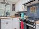Bright kitchen featuring wood counters, ample counter space, and stainless steel appliances at 805 E 15Th Ave, New Smyrna Beach, FL 32169