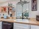 Kitchen featuring wood counters, modern appliances, and ample natural light at 805 E 15Th Ave, New Smyrna Beach, FL 32169
