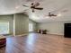 Large living room boasts recessed lighting, vaulted ceiling and hardwood floors; a versatile space for living at 830 Christy Dr, Port Orange, FL 32129