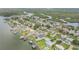 Beautiful waterfront property with lush green surroundings and serene river views at 90 Cunningham Dr, New Smyrna Beach, FL 32168