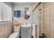 Stylish bathroom with modern fixtures, a well-lit vanity, and a convenient glass-enclosed shower at 90 Cunningham Dr, New Smyrna Beach, FL 32168