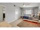 Neat bedroom featuring hardwood floors, two windows, ample closet space, and a charming vanity at 90 Cunningham Dr, New Smyrna Beach, FL 32168