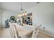 Dining room featuring table with seating for six and decorative buffet at 90 Cunningham Dr, New Smyrna Beach, FL 32168