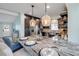 Modern kitchen featuring granite countertops, stainless steel appliances, and decorative lighting at 90 Cunningham Dr, New Smyrna Beach, FL 32168