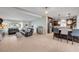 Bright open-concept living space seamlessly connects the living room and kitchen for easy living at 90 Cunningham Dr, New Smyrna Beach, FL 32168