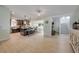 Open floor plan featuring an island kitchen and dining area with lots of natural light at 90 Cunningham Dr, New Smyrna Beach, FL 32168