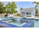 Gorgeous pool featuring a jacuzzi spa and inground fountains at 90 Cunningham Dr, New Smyrna Beach, FL 32168