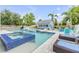 Beautiful pool with spa, pool house and multiple areas to relax at 90 Cunningham Dr, New Smyrna Beach, FL 32168