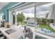 Bright home office with a view of the backyard and its detached building at 90 Cunningham Dr, New Smyrna Beach, FL 32168