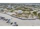 Coastal home nestled on the beach with balconies, surrounded by trees and the ocean, for beautiful views at 951 N Atlantic Ave, New Smyrna Beach, FL 32169