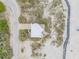 Top-down aerial perspective of the beach house with its unique architecture and layout at 951 N Atlantic Ave, New Smyrna Beach, FL 32169