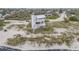 Coastal home with balconies, nestled on the beach near the ocean, with beautiful community views at 951 N Atlantic Ave, New Smyrna Beach, FL 32169
