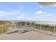 Balcony featuring two chairs and a view of the beach and ocean at 951 N Atlantic Ave, New Smyrna Beach, FL 32169