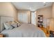 Cozy bedroom featuring neutral walls, a comfortable bed, and a closet for ample storage space at 951 N Atlantic Ave, New Smyrna Beach, FL 32169