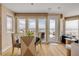 Dining area boasts ocean views, contemporary furnishings, and direct access to a deck at 951 N Atlantic Ave, New Smyrna Beach, FL 32169