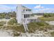 Coastal home with multiple balconies, great natural light, and access to the beach at 951 N Atlantic Ave, New Smyrna Beach, FL 32169