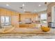 Bright kitchen with stainless steel appliances, granite countertops, and ample cabinet space at 951 N Atlantic Ave, New Smyrna Beach, FL 32169