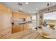 Well-equipped kitchen featuring custom cabinetry, granite counters, stainless steel appliances, and a view at 951 N Atlantic Ave, New Smyrna Beach, FL 32169