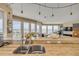 Modern kitchen with custom cabinets, granite countertops, stainless steel appliances, and ocean views at 951 N Atlantic Ave, New Smyrna Beach, FL 32169