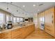 Modern kitchen features custom cabinets, stainless steel appliances, and ocean views at 951 N Atlantic Ave, New Smyrna Beach, FL 32169