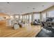 Inviting living room featuring hardwood floors and incredible views of the ocean at 951 N Atlantic Ave, New Smyrna Beach, FL 32169
