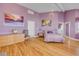 Beautiful main bedroom with hardwood floors, stylish décor, and great lighting, creating a comfortable retreat at 951 N Atlantic Ave, New Smyrna Beach, FL 32169