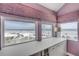 Expansive ocean view from built in shelving in the bedroom, providing natural light and a picturesque scene at 951 N Atlantic Ave, New Smyrna Beach, FL 32169