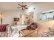 Open-concept living room flowing into the dining area and kitchen at 98 Cypress Pond Rd, Port Orange, FL 32128