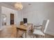 Bright home office featuring an ornate desk, hardwood floors, and lots of natural light at 102 Inlet Shores Dr, New Smyrna Beach, FL 32168