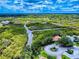 Scenic aerial view of a beautiful landscape featuring a winding river surrounded by lush greenery at 108 Dee St, New Smyrna Beach, FL 32168