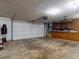 Spacious garage with plenty of storage, workbench, and room for all kinds of projects at 108 Dee St, New Smyrna Beach, FL 32168