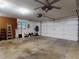 Spacious garage with lots of room for cars, workbench, storage and all kinds of projects at 108 Dee St, New Smyrna Beach, FL 32168