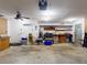 Spacious garage with plenty of storage, workbench, and room for all kinds of projects at 108 Dee St, New Smyrna Beach, FL 32168