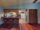 Kitchen with bar seating and appliances at 108 Dee St, New Smyrna Beach, FL 32168