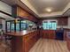 Spacious eat-in kitchen with an island and custom cabinets with unique hardware at 108 Dee St, New Smyrna Beach, FL 32168