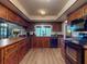 Kitchen with wood cabinets, countertops, and stainless steel appliances at 108 Dee St, New Smyrna Beach, FL 32168