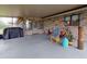 Covered patio with colorful decor and outdoor seating at 108 Dee St, New Smyrna Beach, FL 32168