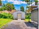 Exterior view of a storage shed with a ramp for easy access on a sunny day at 108 Dee St, New Smyrna Beach, FL 32168