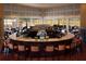 Elegant bar area with ample seating and a great view of the golf course at 113 Pitching Wedge Dr, Daytona Beach, FL 32124