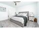 Comfortable main bedroom with a plush bed and a serene atmosphere at 113 Pitching Wedge Dr, Daytona Beach, FL 32124