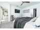 Cozy main bedroom featuring stylish décor, a comfortable chair, and ample natural light at 113 Pitching Wedge Dr, Daytona Beach, FL 32124