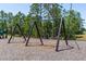Swings set in a playground setting, promising hours of fun for the whole Gathering at 113 Pitching Wedge Dr, Daytona Beach, FL 32124