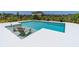 Sparkling pool with submerged lounge chairs, perfect for relaxation and enjoyment at 113 Pitching Wedge Dr, Daytona Beach, FL 32124