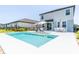 Aerial view of a backyard with a pool, dining area, and landscaping at 113 Pitching Wedge Dr, Daytona Beach, FL 32124